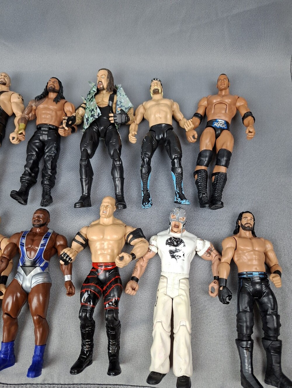 WWE Wrestlers lot of 16 Various condition.  Cena, Roman, Undertaker plus more. - Picture 2 of 3